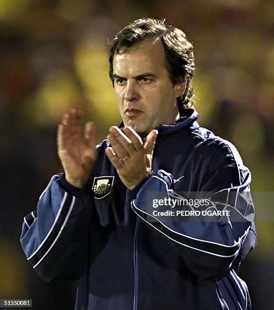 Marcelo Bielsa, coach of the Argentine soccer team, applauds before the game between Colombia and Argentina started in Bogota, Colombia 29 June,...