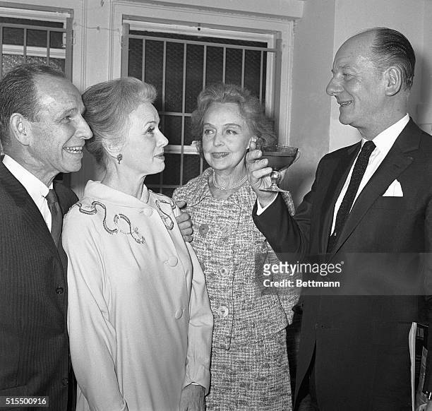 Famed British actor Sir John Gielgud proposes a toast to Hume Cronyn and Jessica Tandy and actress Lillian Gish Looks on . Gielgud and Miss Gish...