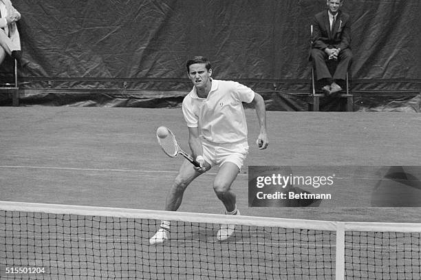 Wimbledon champion Billie Jean King of Long Beach, California, and Australia's Roy Emerson are all business en route to first round victories in the...