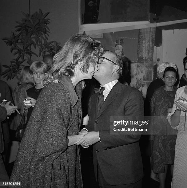 Truman Capote kisses actress Geraldine Page on the cheek at a party in his honor recently. At the party Capote's A Christmas Memory was previewed. It...