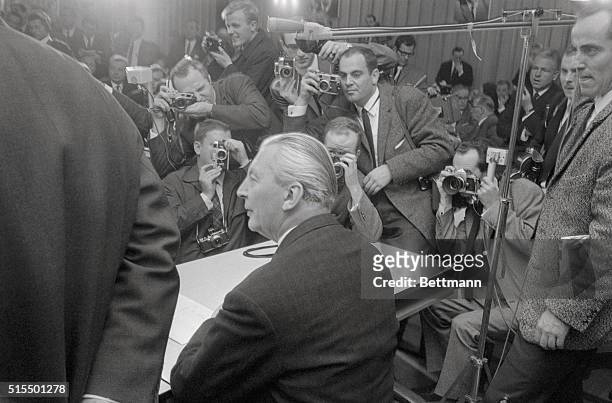 Bonn: Ex-Nazi Named To Succeed Erhard. Photographers crowd around Kurt George Kiesinger after he was named by the Christian Democratic Union to...