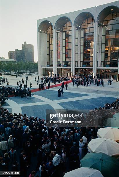 Lush red carpet, 163 feet long and seven feet wide, was the path traveled to enter the New Metropolitan Opera House, which opened September 16th. A...