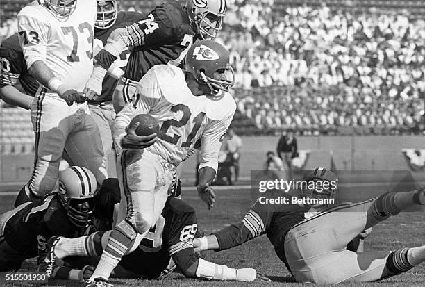 Mike Garrett, of the Kansas City Chiefs, gains four tough yards against the Green Bay Packers during the Super Bowl Game here.