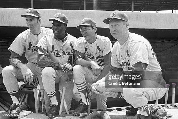 Four St. Louis Cardinals who will be in the 1968 All star game in Houston are shown in dugout before game against the Cubs. From left are pitcher...