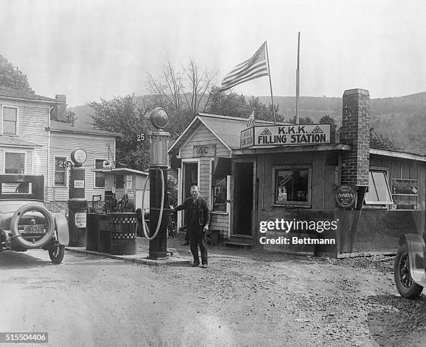 Charles Woodcock, of Painted Post, N.Y., has the only KKK filling station in the East. He has to stand for jeering and abuse from passing motorists...