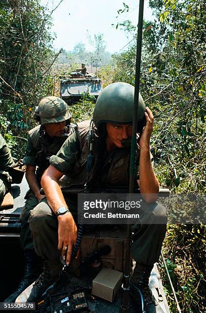 Soldiers from the 1st Cavalry of the 25th Infantry Division on Operation Complete Victory a few kilometers southwest of Phouc Vinh, go through...