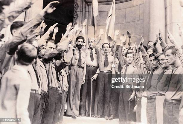 Here is a group of typical "green shirts" or integralistas, of Brazil, whose revolt against the regime of President Getulio Vargas today was...