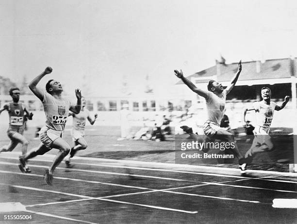 THE 1920 ANTWERP OLYMPICS. CHARLIE PADDOCK WINNING OLYMPIC TITLE WITH HIS TRADEMARK FLYING FINISH. PHOTO, 1920.