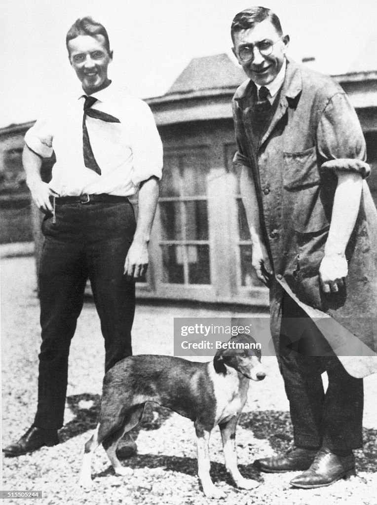 Charles Best and Frederick Banting with Dog