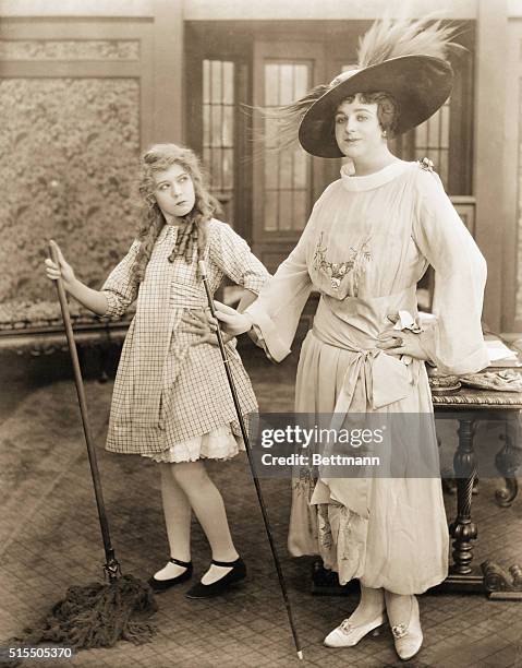 "Our Mary" Impersonates Julian Eltinge. It is no particularly easy matter to impersonate the fashionable Julian Elting in a gingham dress such as...