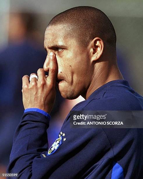 Player for the Brazilian Selection, Roberto Carlos, signals to his teammates, 15 July 2000, during a practice in Fox de Iguazu, Brazil. Brazil and...