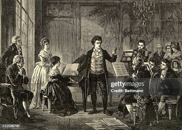 German composer Ludwig van Beethoven conducting one of his three 'Rasumowsky' string quartets, circa 1810. Woodcut by German artist Richard...