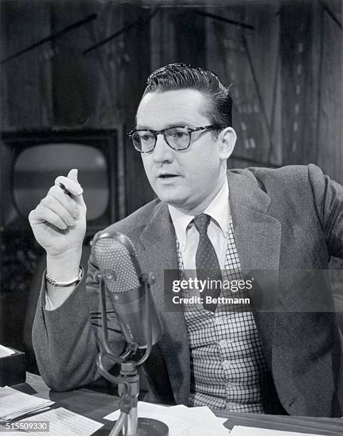 Actor Steve Allen sits at a microphone during an interview. Undated Photograph circa 1955.