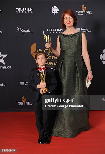 Jacob Tremblay and Emma Donoghue pose in the press room at the 2016 Canadian Screen Awards at the Sony Centre for the Performing Arts on March 13,...