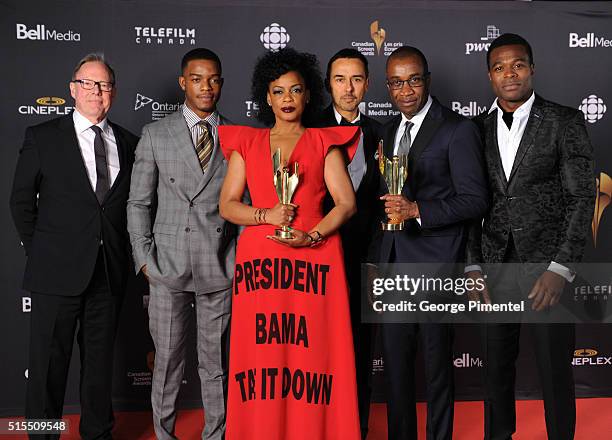 Bill Niven, Stephan James, Aunjanue Ellis, Damon D'Oliveira, Clement Virgo and Lyriq Bent pose in the press room at the 2016 Canadian Screen Awards...