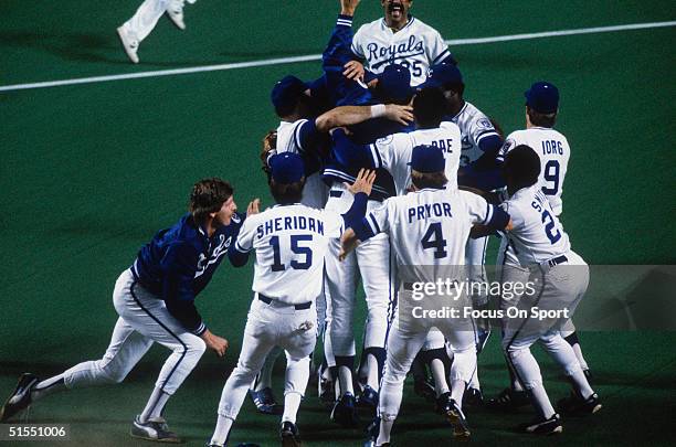 The Kansas City Royals celebrate after winning Game Seven during the World Series against the St. Louis Cardinals at Royals Stadium on October 27,...