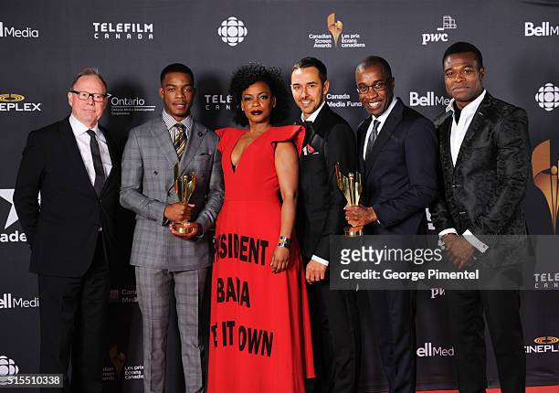 Bill Niven, Stephan James, Aunjanue Ellis, Damon D'Oliveira, Clement Virgo and Lyriq Bent pose in the press room at the 2016 Canadian Screen Awards...