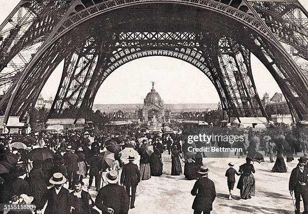 Crowd under the Eiffel Tower during the 1889 Paris Exposition.