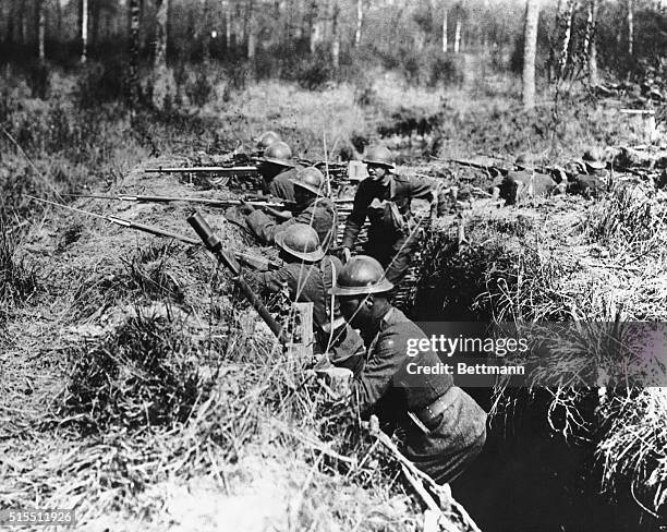 The 369th Infantry, 93rd Division, fights from the trenches during a battle along the Western Front, circa 1915.
