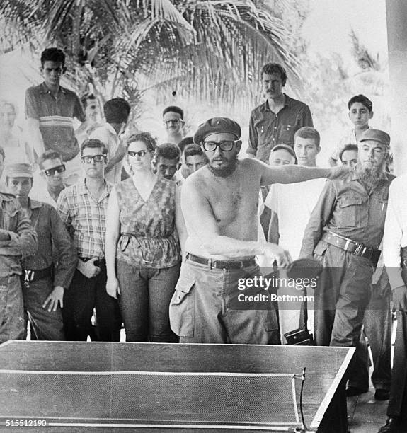 Cuban leader Fidel Castro displays a mean backhand, and a bare midsection, as he plays a game of Ping-Pong with one of the American students who...