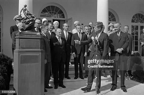 The Collier Trophy - aviation's highest award was bestowed on the seven original astronauts at the White House today. Left to right, front: NASA...