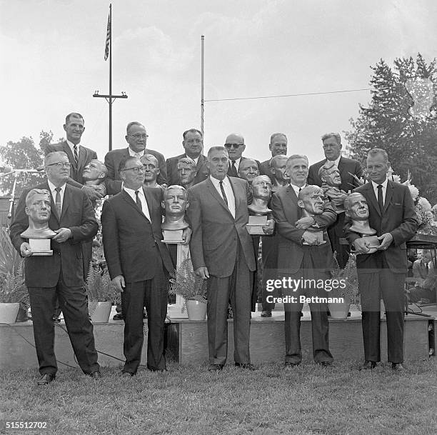 Canton Professional Football Hall of Fame dedication. Front row, left to right: Earl "Dutch" Clark, Earl Louis "Curly" Lambeau, Mel Hein, John...