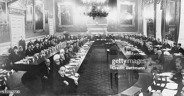 London, England- General view of India Conference in session shows, at extreme left, Moslem Ruler the Aga Khan.In center background is the Marajah of...