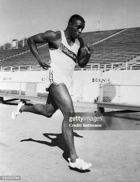 Probably the fastest man on Earth, Bob Hayes, of Florda A&M University, works out on the school's track in Tallahassee, Florida. He set a new world...