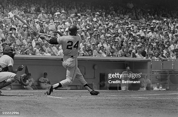 Willie Mays slams his 2,000th hit of his career in the first inning here against the Dodgers, for a double to score teammate Felipe Alou with the...