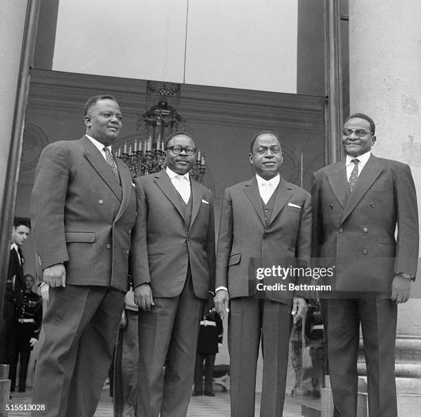 African leaders of the four states of Dahomey, Upper Volta, Ivory Coast, and Niger pose at the door of the Elysee Palace after seeing President De...
