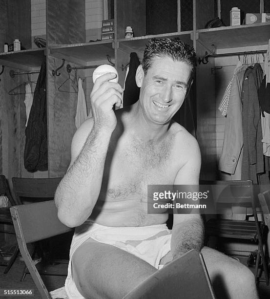 Ted Williams smiles broadly in the Boston Red Sox locker room after belting his 500th Major League home run. Williams joined a select group of Babe...