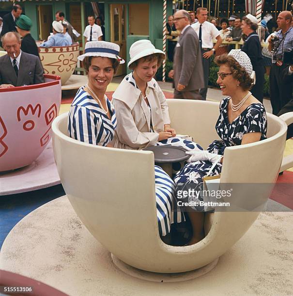 Princess Margaretha of Sweden, Princess Margaretha of Denmark and Princess Astrid of Norway, on a teacup ride at Disneyland, Anaheim, California,...