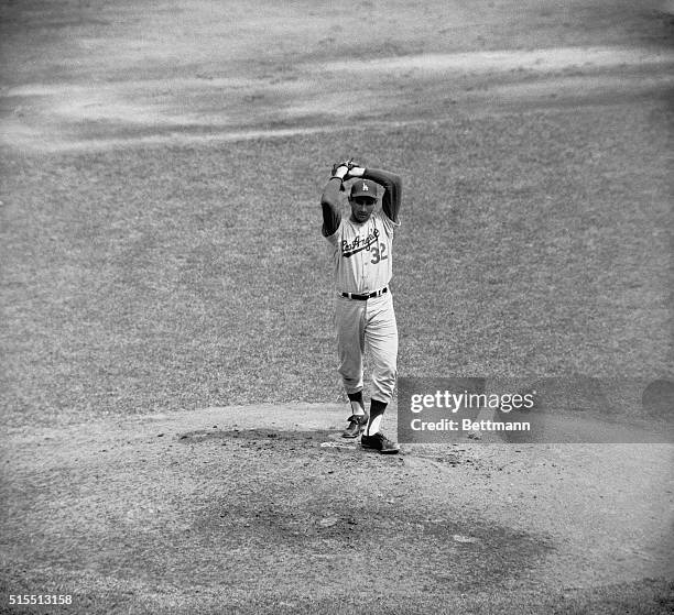 Sandy Koufax of Los Angeles Dodgers notching win against the New York Mets at the Polo Grounds