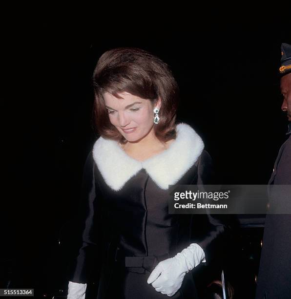 Mrs. Jacqueline Kennedy with her escort, Alan Jay Lerner, arrives at the Mark Hellinger Theater, December 7th, for a performance of On a Clear Day...
