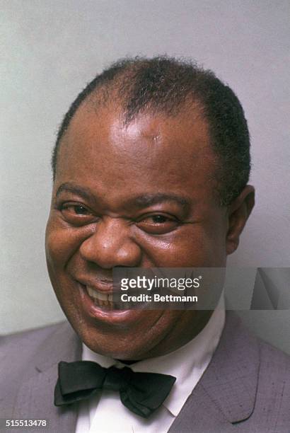 Kansas City, MO: close-up of Louis Armstrong prior to his taking stage for November 7th performance at Kansas City auditorium.