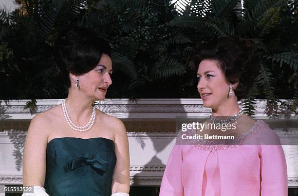 Washington D.C... Mrs. Lyndon B. Johnson and Britain's Princess Margaret pose for photographers on the Queen's room at the White House November 17th,...