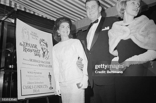 Mrs. Jacqueline Kennedy and Franklin D. Roosevelt Jr. Arrive for the premiere of the film "The Eleanor Roosevelt Story" here on November 7. The...