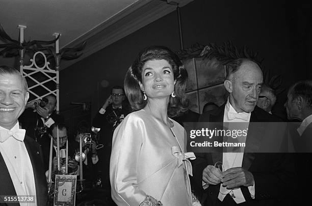 Mrs. Jacqueline Kennedy , who is shown here with Henry B. Cabot, Board President of the Boston Symphony Orchestra. Mrs. Kennedy attended the Golden...