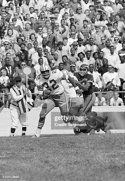 Fleet-footed Bob Hayes of the Dallas Cowboys takes a handoff in the second quarter and raced 11 yards for a touchdown. The Cowboys recovered four...