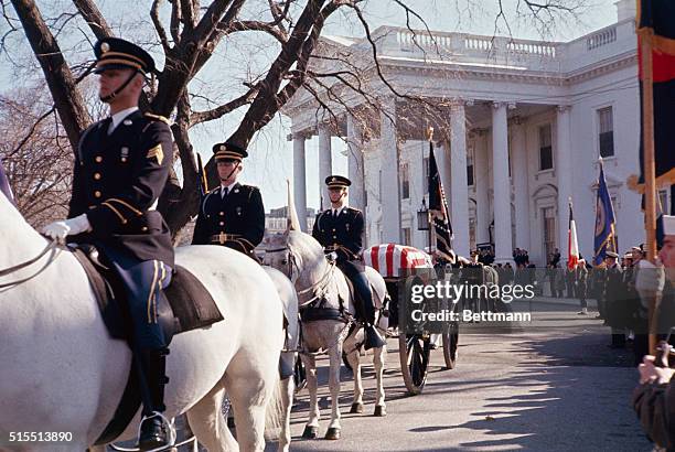 Washington, D.C.:Caisson waiting at White House as procession is organized or solemn rites at St. Matthew's Cathedral for John F. Kennedy Cathedral.