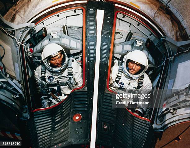 Cape Kennedy, Florida....Astronauts Walter Schirra and Tom Stafford in their Gemini 6 spacecraft during training for upcoming orbital flight.