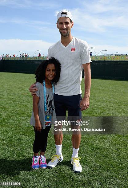 Novak Djokovic of Serbia meets Milan Tyson during day seven of the BNP Paribas Open at Indian Wells Tennis Garden on March 13, 2016 in Indian Wells,...