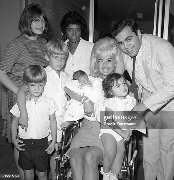 Actress Jayne Mansfield and family are pictured here as the blonde actress leaves Cedars of Lebanon Hospital with the newest addition to the family,...