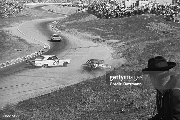 Riverside, Calif.: Bobby Allison of Hueytown, Ala, in a 64 Ford spins out of the way to avoid hitting Clyde Prickett of Fresno, Calif. In another 64...