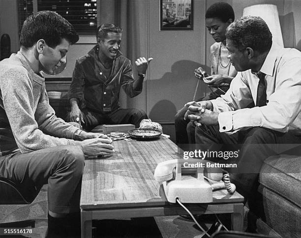 On the set are the stars of the movie, "A Man Named Adam." They are Frank Sinatra Jr., Sammy Davis Jr., Cicely Tyson and Ossie Davis.