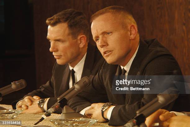 Gemini 8 Astronauts command pilot Neil A. Armstrong and co-pilot David Scott, answer questions concerning their upcoming space mission at a February...