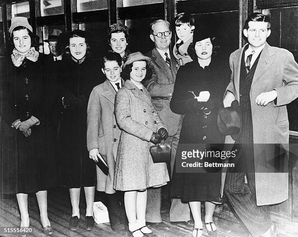 Joseph P. Kennedy, US Ambassador to Great Britain aboard the SS Manhattan with 8 of his 9 children on hand to wish him Bon Voyage. Left to right;...