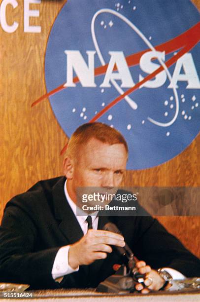 Closeups of Gemini 8 Command Pilot Neil A. Armstrong at February 26 Press Conference prior to the coming March Space Mission. Plans call for a walk...