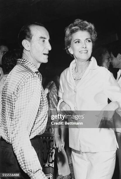 Acapulco, Mexico: Italian designer, Emilio Pucci, does the frug with Anita "The Face" Colby at a party given in his honor.