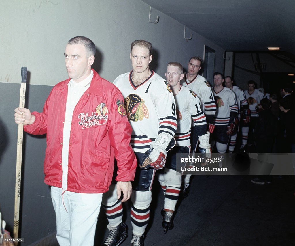 Bobby Hull Walking With Team to Locker Room